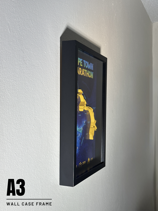 Wall case frame displaying a 3D poster of a marathon runner on a white wall.